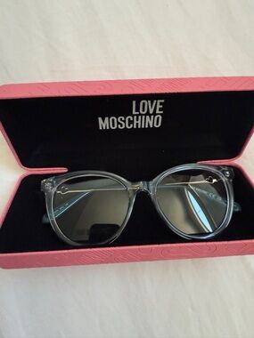 Love Moschino Clear Frame Sunglasses with Black Lenses